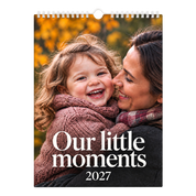 Picsme A5 single-page photo calendar with the Our little moments 2027 cover, showing a mother and laughing young daughter with white Wire-O binding and a white hanger.