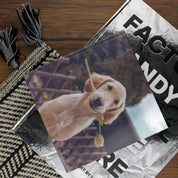 Lifestyle image of a square hardcover personalised photo book printed in the UK using FSC-certified paper
